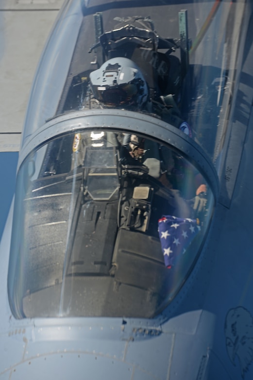 A U.S. Air Force F-15C Eagle from RAF Lakenheath flies behind a U.S. Air Force KC-135 Stratotanker from RAF Mildenhall during Exercise Point Blank over England, May 24, 2018. The exercise is a recurring large-force exercise designed and co-hosted by the Royal Air Force and the 48th Fighter Wing. It is a low-cost initiative created to increase tactical proficiency of the Department of Defense and Ministry of Defence forces stationed within the United Kingdom and Europe. (U.S. Air Force photo by Senior Airman Luke Milano)