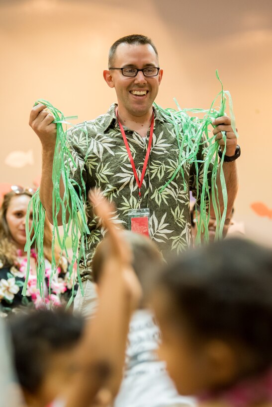 Capt. Charles Dey, 379th Air Expeditionary Wing chaplain, speaks to attendees of Vacation Bible School at Al Udeid Air Base, Qatar, May 25, 2018. The two-day event, hosted by the 379th Air Expeditionary Wing Chaplain Corps, integrated biblical lessons and team-building activities. (U.S. Air Force photo by Staff Sgt. Joshua Horton)