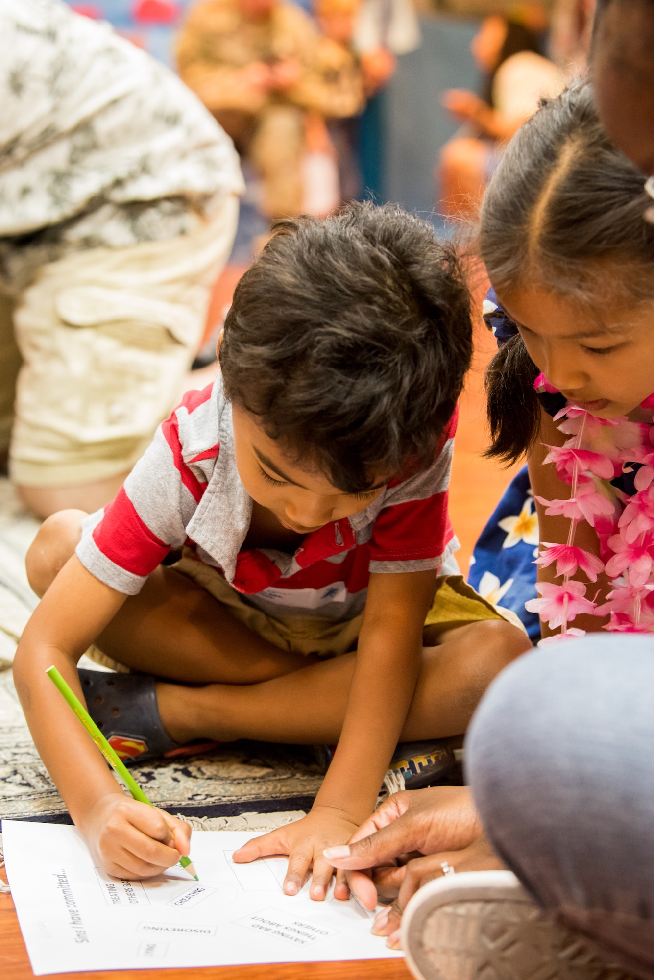Children of command-sponsored families participate in various activities during Vacation Bible School at Al Udeid Air Base, Qatar, May 25, 2018. The two-day event, hosted by the 379th Air Expeditionary Wing Chaplain Corps, integrated biblical lessons and team-building activities. (U.S. Air Force photo by Staff Sgt. Joshua Horton)