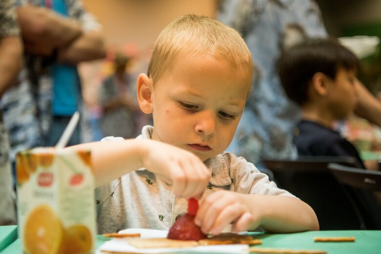 Children of command-sponsored families participate in various activities during Vacation Bible School at Al Udeid Air Base, Qatar, May 25, 2018. The two-day event, hosted by the 379th Air Expeditionary Wing Chaplain Corps, integrated biblical lessons and team-building activities. (U.S. Air Force photo by Staff Sgt. Joshua Horton)