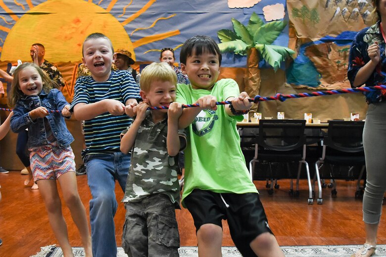 Children of command-sponsored families participate in team-building activities during Vacation Bible School at Al Udeid Air Base, Qatar, May 24, 2018. The two-day event, hosted by the 379th Air Expeditionary Wing Chaplain Corps, integrated biblical lessons and fun activities. (U.S. Air Force photo by Staff Sgt. Enjoli Saunders)