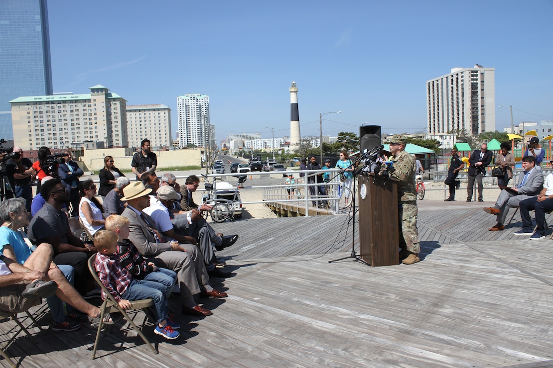 USACE Philadelphia District Deputy Commander MAJ Brian Corbin made remarks during a ribboncutting ceremony for the Absecon Inlet seawall and boardwalk rebuild on May 25, 2018 in Atlantic City.