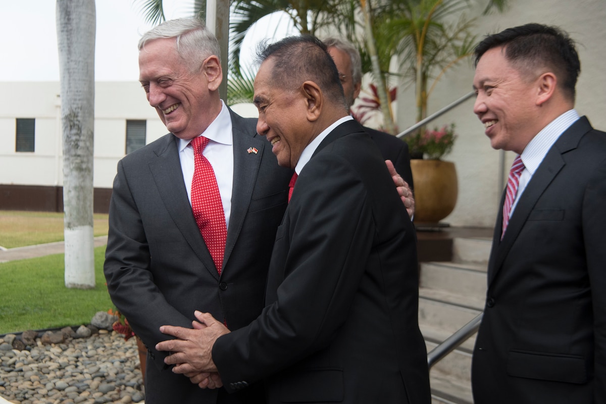 Defense Secretary James N. Mattis greets the Indonesian Minister.