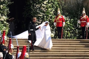 The Duke and Duchess of Sussex depart from St. George’s Chapel.
