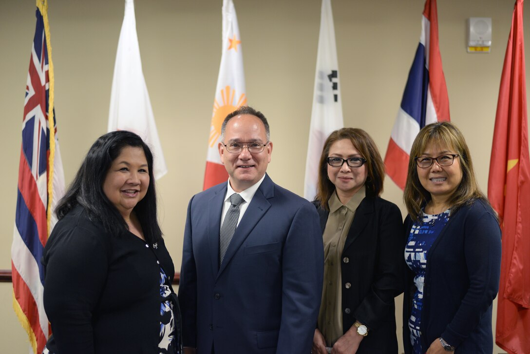 Defense Contract Management Agency team members Sandi Bennett, the Mission Support Office chief; Erik Imajo, a Human Capital Business Skills and Leader Development team lead; Daisy Garcia, a Financial and Business Operations budget analyst; and Kaylee Gouldie, a Contracts Directorate contract specialist, joined headquarters employees in celebrating Asian American and Pacific Islander Heritage Month at Fort Lee, Virginia, May 22. (DCMA photo by Stephen Hickok)