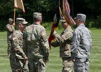 Outgoing commander Col. Andrew Harris relinquished command to incoming commander Col. Nathan Lord during the ceremony.