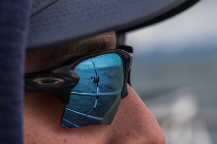 Army Sgt. John Lopez, a Bravo Company, 209th Aviation Support Battalion, 25th Combat Aviation Brigade, 25th Infantry Division structural aircraft maintainer, watches his fishing pole during the Armed Services YMCA of Alaska Combat Fishing Tournament in Seward, Alaska, May 24, 2018. Lopez has never been charter fishing in Alaska and was assigned to Puffin Fishing Charters vessel ‘Tenacious.’ Founded in 2006, the tournament was established as a way of showing thanks and honor to service members through an opportunity to go deep-sea fishing.