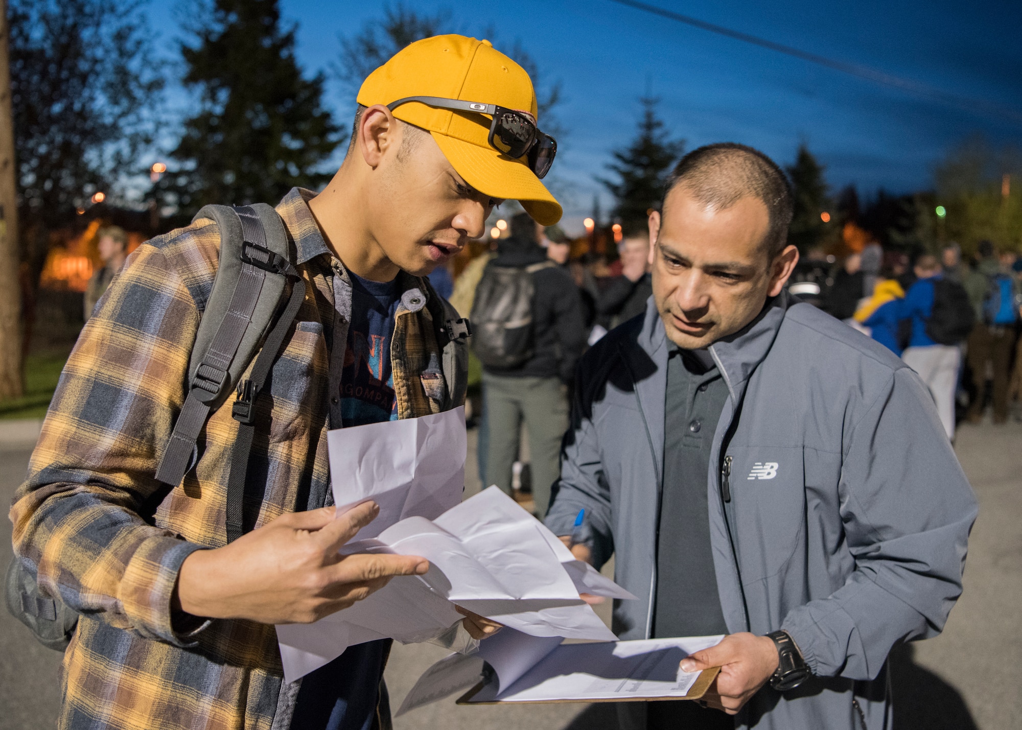 Army Sgt. 1st Class Anthony Barragan, a U.S. Army Alaska operations sergeant, checks the boarding pass and fishing license of Air Force Staff Sgt. Aaron Reyes, a 477th Maintenance Squadron low observable craftsman, before departing on the 2018 Armed Services YMCA of Alaska Combat Fishing Tournament in Anchorage, Alaska, May 24,2018. The tournament was established in 2006 as a way of showing thanks and honor to service members through an opportunity to go deep-sea fishing. Because of community support and the volunteerism of the more than 660 crew members and 275 professional fishing charters supplying their time and services, more than 2,400 currently serving military personnel have been able to participate since its inception.