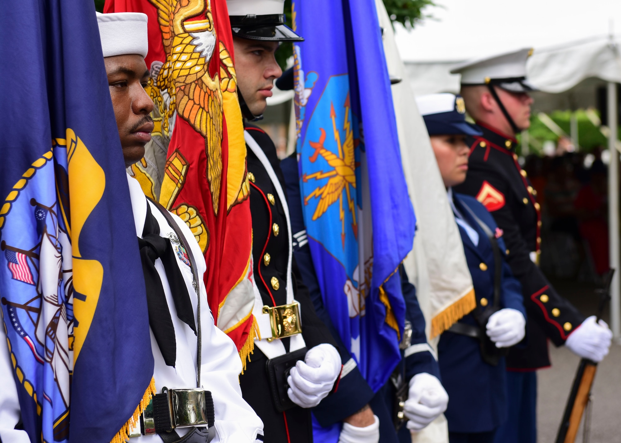 U.S. service members present the colors during a Memorial Day wreath-laying ceremony at Hampton National Cemetery in Hampton, Virginia, May 28, 2018. The ceremony paid tribute to fallen service members who made the ultimate sacrifice for the nation. (U.S. Air Force photo by Airman 1st Class Monica Roybal)