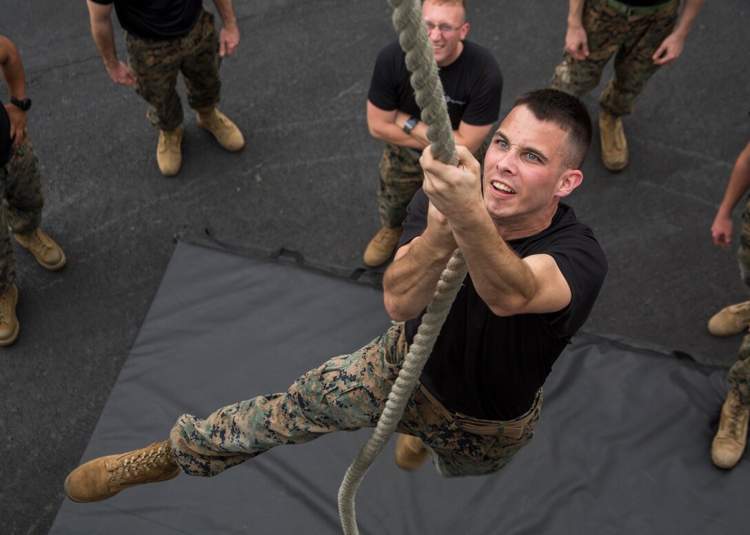 Sergeant Bradley Brown, an administration clerk with 6th Marine Corps District, participates in the battles won challenge as part of the Coca-Cola 600 at the Charlotte Motor Speedway on May 24, 2018. The Marines took part in the battles won challenge trailer at the Coca-Cola 600 NASCAR race to spread awareness of the opportunities that the Marine Corps can provide. (U.S. Marine Corps photo by Lance Cpl. Jack A. E. Rigsby)