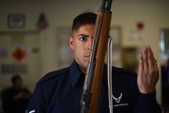 U.S. Air Force Airman First Class Mario Hernandez, 60th Medical Operations Squadron aerospace medical technician, practices firing party movements May 18, 2018 at the Honor Guard Building at Travis Air Force Base, Calif. Travis’ Honor Guard covers 45,000 sq. miles to include four National cemeteries, two Veterans Administration cemeteries and every private resting area between. (U.S. Air Force photo by Airman 1st Class Jonathon D. A. Carnell)