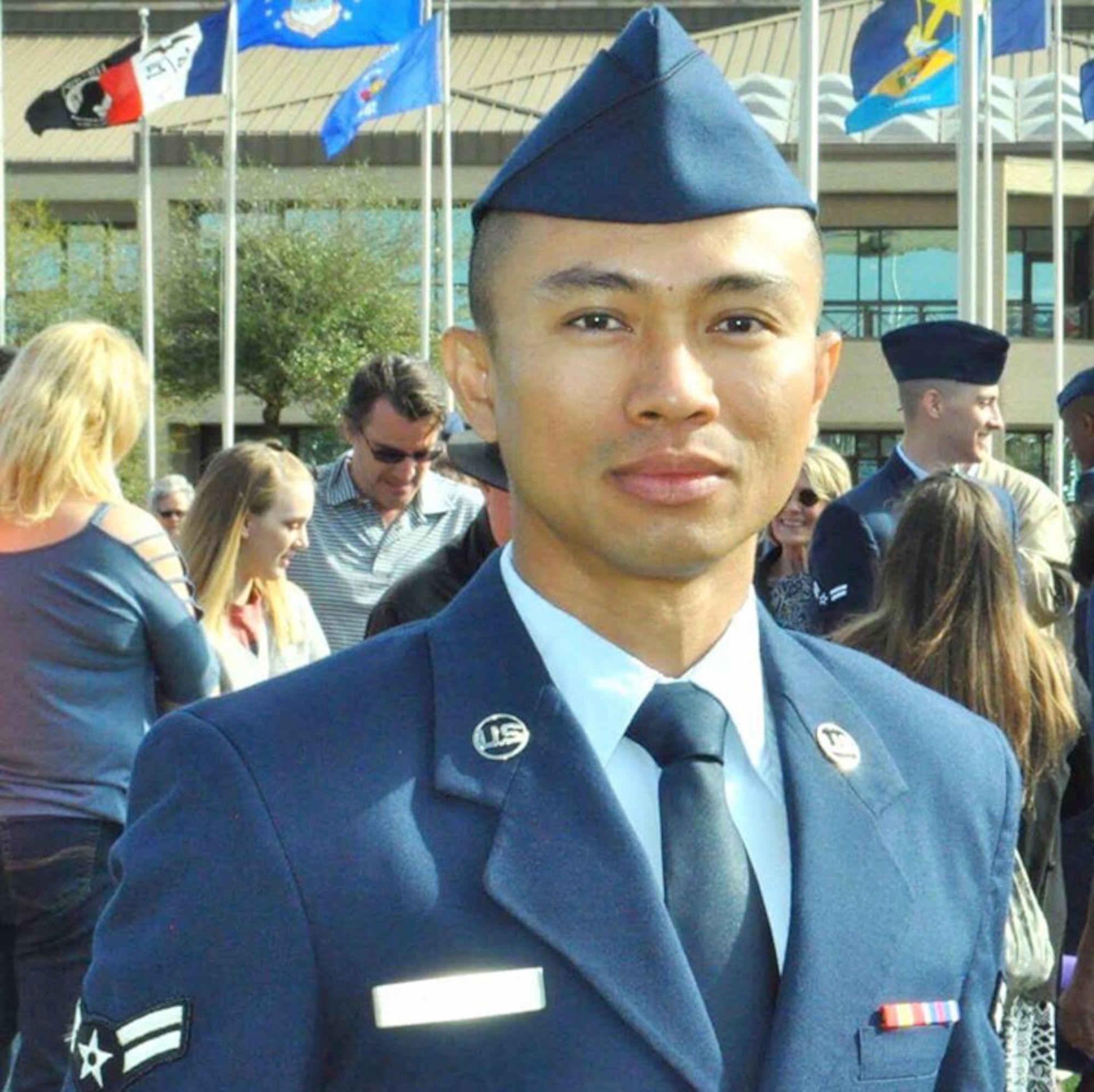 Airman 1st Class Kornkawee Rue Art, 23d Medical Support Squadron pharmacy technician, poses for a photo after graduating basic military training, Feb. 16, 2017, at Joint Base San Antonio, Texas. After spending 18 years as a monk, Rue Art traded his robes for a uniform, in his continual pursuit of a life bigger than himself; one of meaning and purpose. (Courtesy Photo)