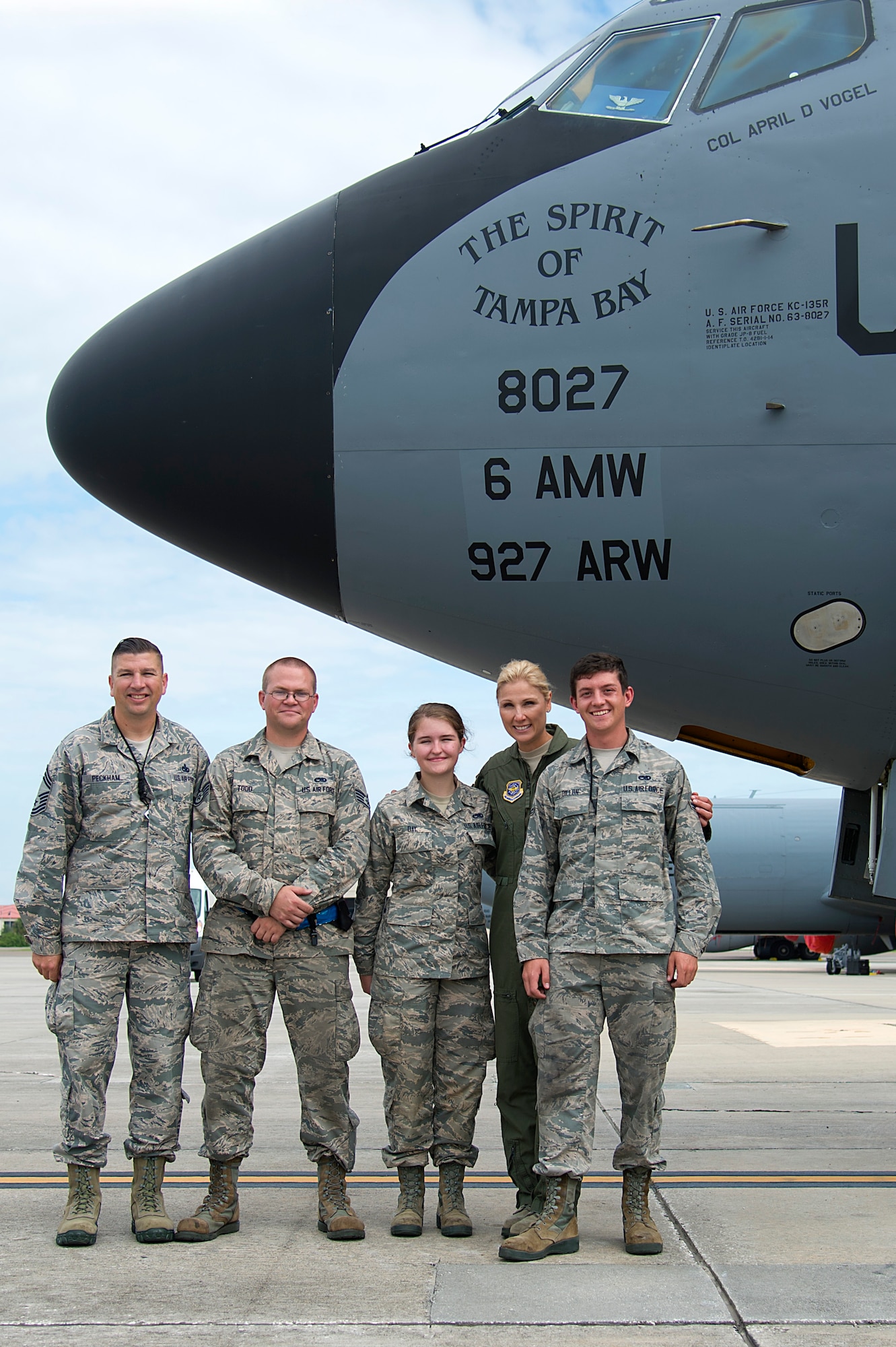 U.S. Air Force Col. April Vogel (second from right), commander of the 6th Air Mobility Wing, pauses for a photo with Airmen next to a KC-135 Stratotanker aircraft at MacDill Air Force Base, Fla., before taking off on her fini-flight May 24, 2018. Vogel piloted the tanker for a final time as she prepares to relinquish command June 29, 2018.