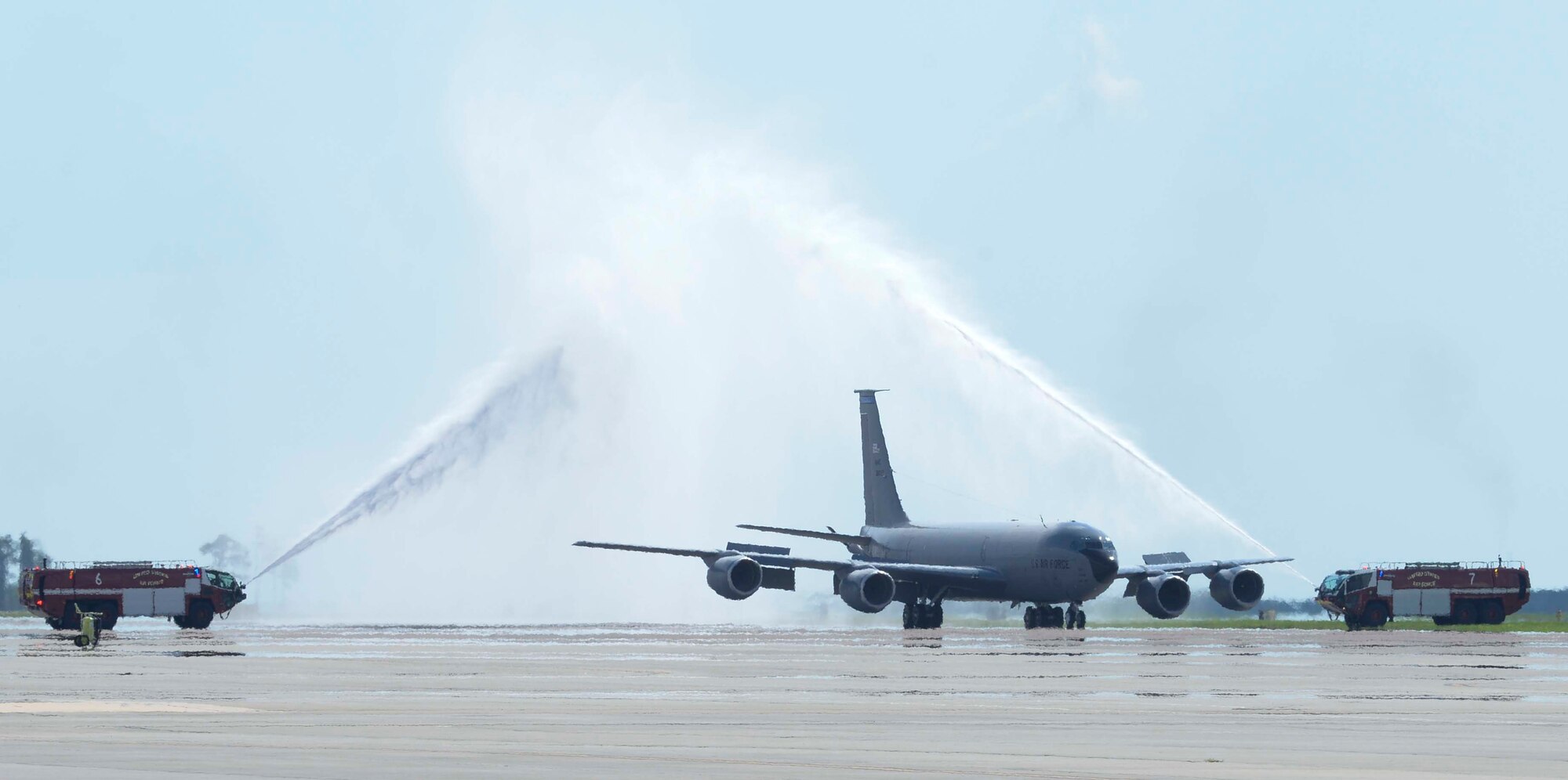 A KC-135 Stratotanker aircraft gets sprayed with water as it taxis down the flightline at MacDill Air Force Base, Fla., May 24, 2018. U.S. Air Force Col. April Vogel, commander of the 6th Air Mobility Wing, piloted the tanker for her final flight at MacDill.