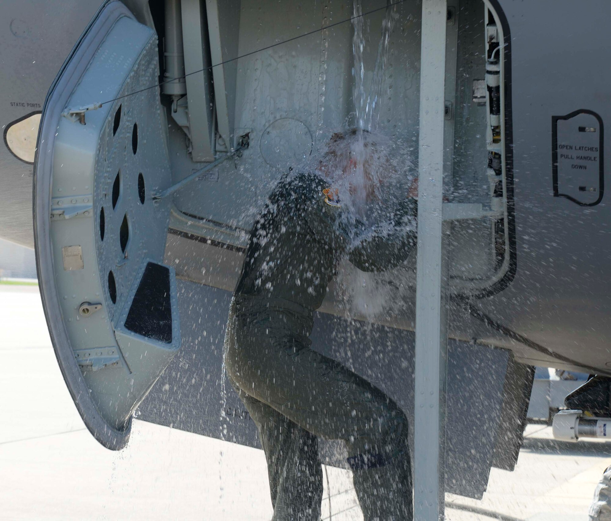 U.S. Air Force Col. April Vogel, commander of the 6th Air Mobility Wing, is soaked with water after her fini-flight at MacDill Air Force Base, Fla., May 24, 2018. Vogel’s two-year tenure comes to an end as she prepares to relinquish command on June 29, 2018.