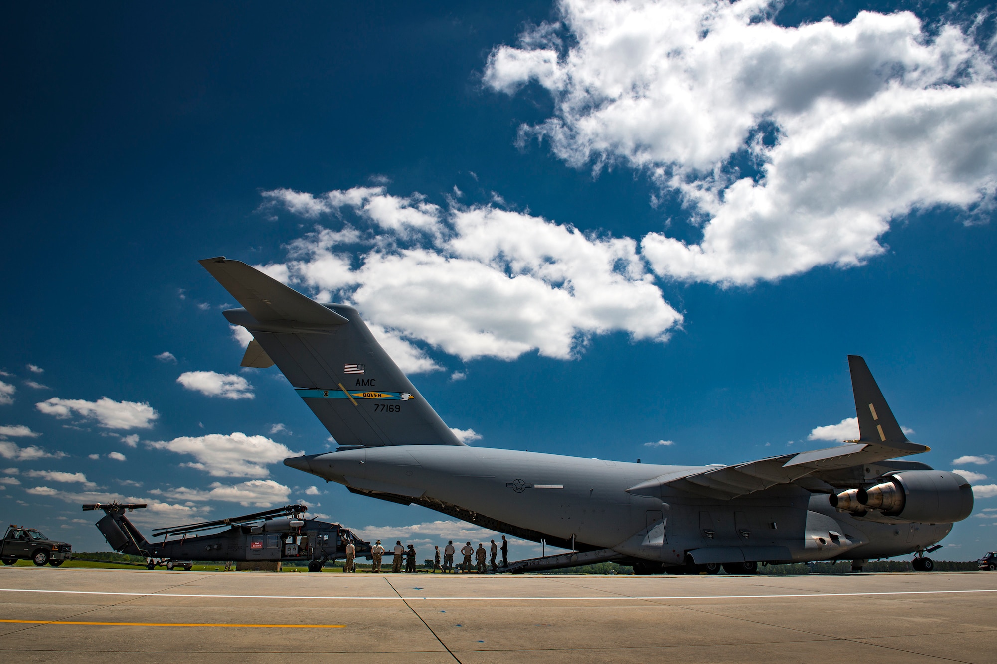 Airmen from the 41st Helicopter Maintenance Unit load an HH-60G Pave Hawk into a C-17 Globemaster III, May 15, 2017, at Moody Air Force Base, Ga. Rescue Airmen from the 23d Wing visited the Devil Raiders of the 621st Contingency Response Wing (CRW), May 21-23, to better understand the essential assets to stand up rescue operations from bare-base situations.(U.S. Air Force photo by Staff Sgt. Ryan Callaghan)