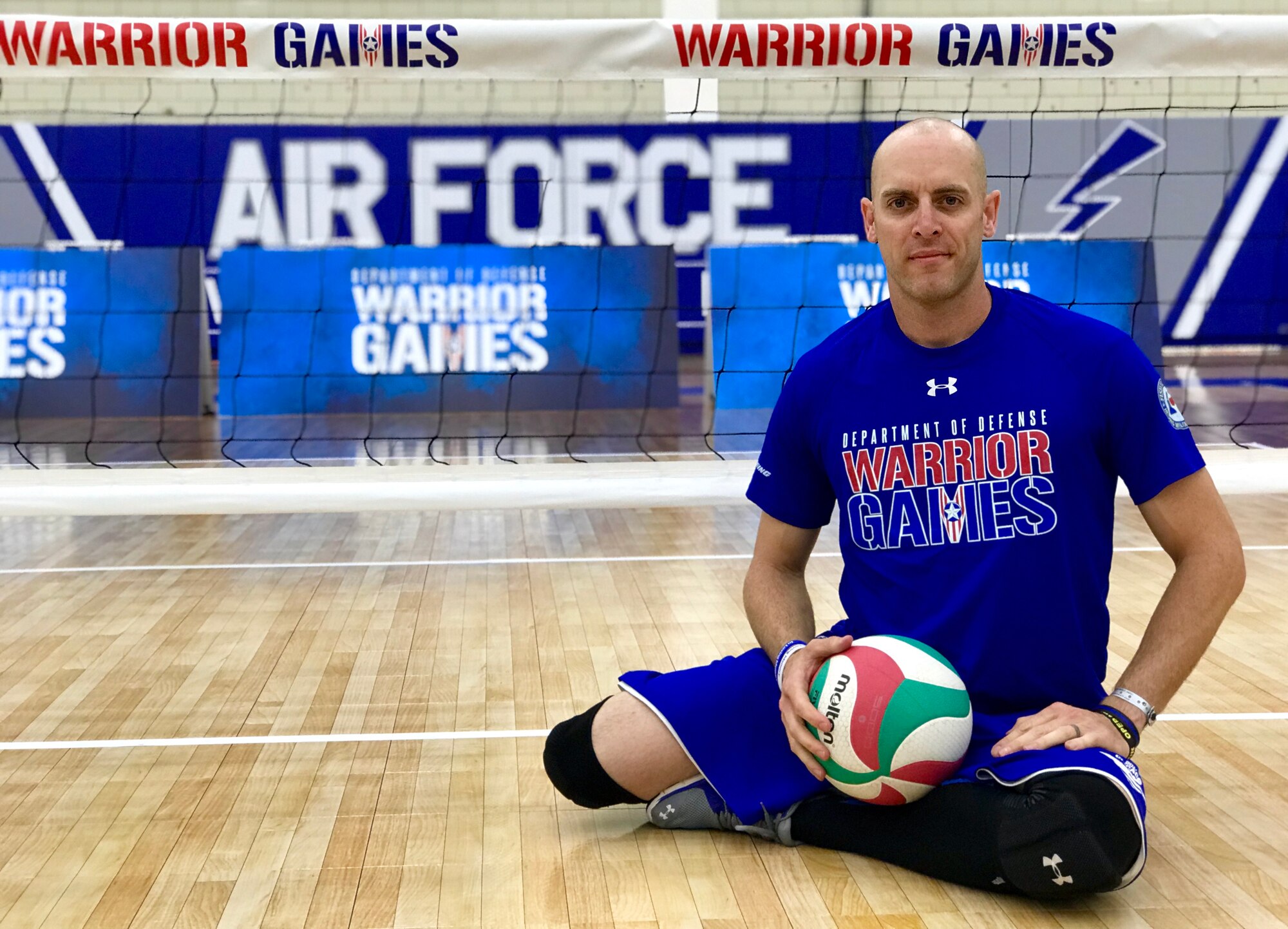 U.S. Air Force Special Agent Bill Lickman, Air Force Office of Special Investigations (AFOSI), sits on the court during sitting volleyball practice May 29, 2018, at the U.S. Air Force Academy, Colorado Springs, Colo.