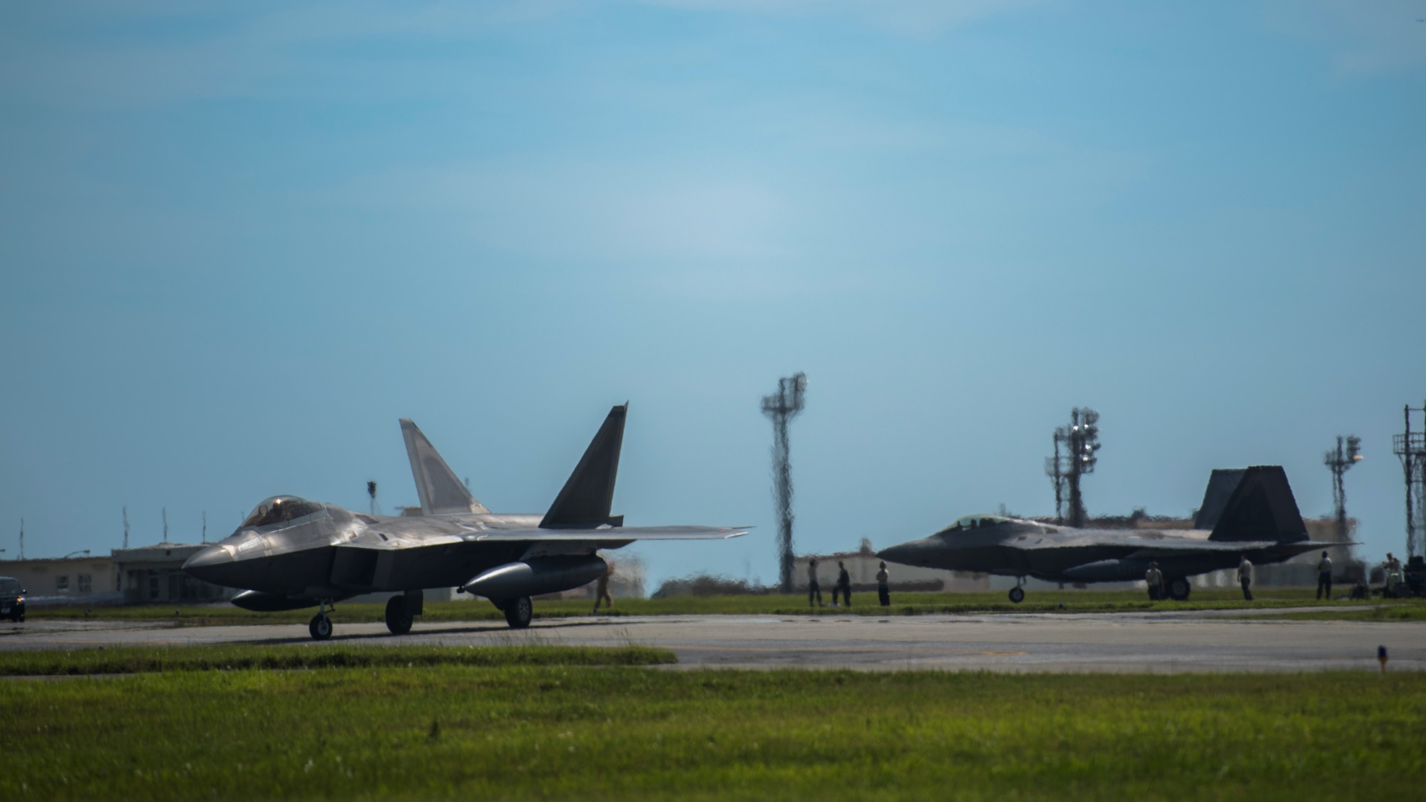U.S. Air Force F-22 Raptors assigned to 525th Fighter Squadron from Joint Base Elmendorf-Richardson taxis at Kadena Air Base, Japan, May 29, 2018 (HST).
