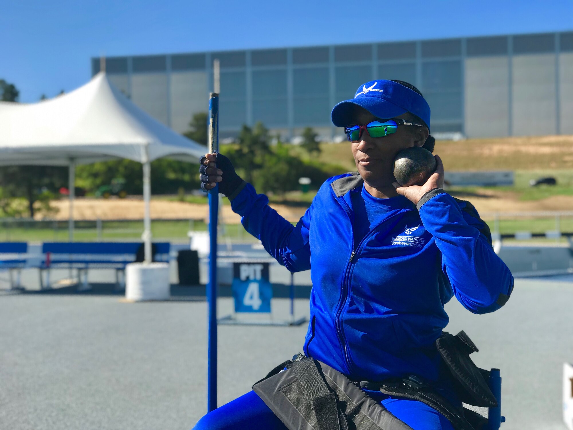 U.S. Air Force Lt. Col. Julie Walker, Joint Staff Logistics (J4) Pentagon, practices seated shot put during field practice May 30, 2018, at the U.S. Air Force Academy, Colorado Springs, Colo.