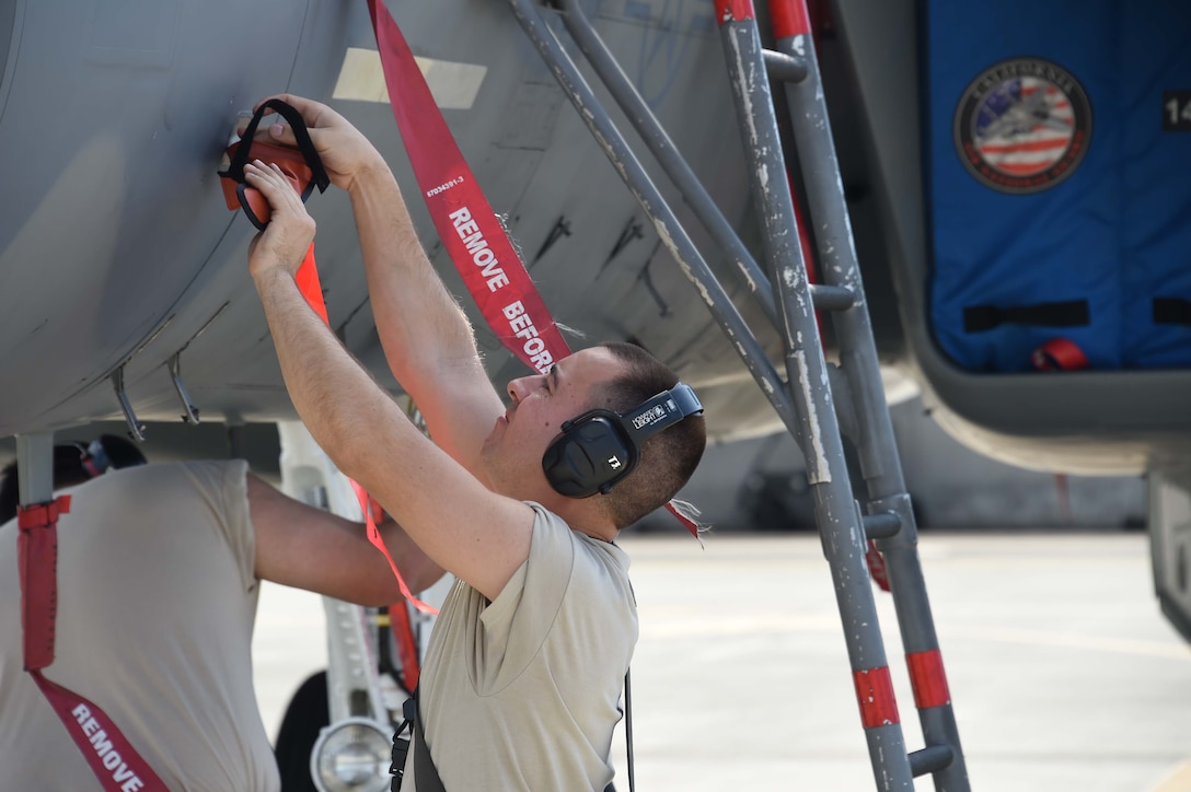 U.S. Air Force Senior Airman Jamie Mabry-Rairigh, 144th Aircraft Maintenance Squadron avionics technician, replaces a pitot tube cover after post-flight checks on an F-15C Eagle fighter jet during Sentry Aloha 18-01 Jan. 9, 2018 at Joint Base Pearl Harbor-Hickam, Hawaii.