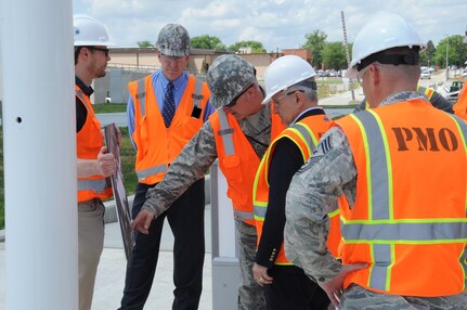 Sen. Jack Reed of Rhode Island (second from right), ranking member of the Senate Armed Services Committee; receives a briefing  on U.S. Strategic Command’s (USSTRATCOM) command and control facility (C2F) from U.S. Air Force Maj. Gen. Richard Evans III, USSTRATCOM project manager for the C2F, at Offutt Air Force Base, Neb., May 30, 2018.