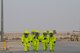 Airmen from the 386th Expeditionary Civil Engineer Squadron emergency management office walk to a decontamination site after responding to hazardous materials at an undisclosed location in Southwest Asia, May 30, 2018. The team found materials used to remove rubber from the runway. (U.S. Air Force photo by Staff Sgt. Joshua King)