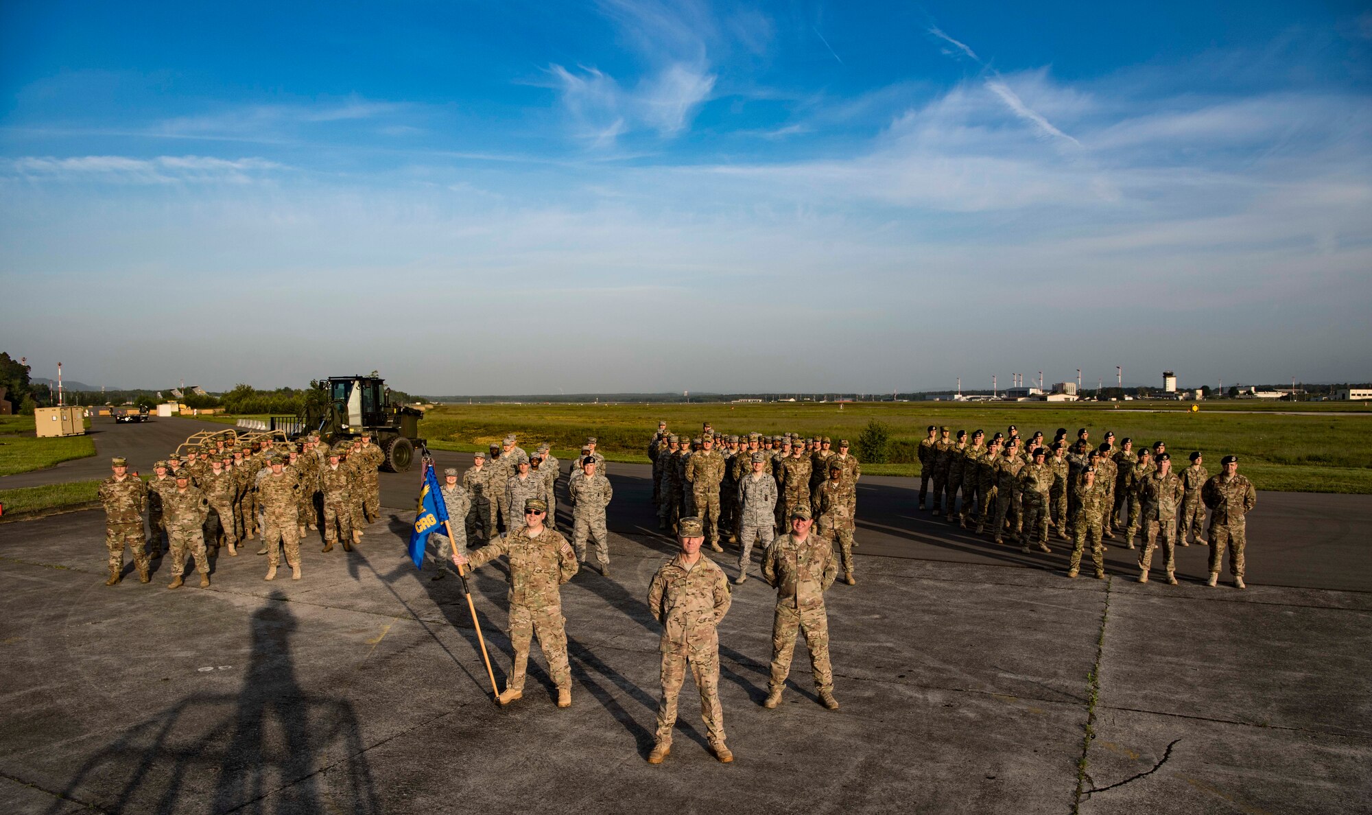 Members of the 435th Contingency Response Group pose for a picture before participating in the 435th CRG Olympics on Ramstein Air Base, Germany, May 18, 2018. The Olympics consisted of a four mile ruck march and a “round robin” of events. Airmen cycled through events such as the obstacle course, a “bare base build-up” and firefight challenge. Other exercises held throughout the day included a first-aid and troop transport drill, and a pallet build-up drill.
