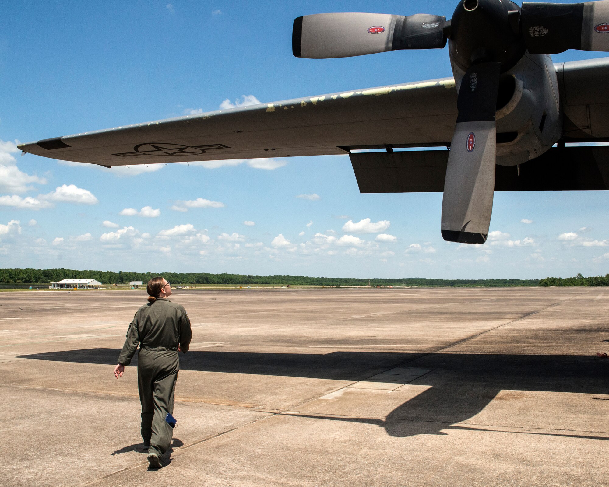 Staff Sgt. Megan Corker, a flight engineer student at the 154th Training Squadron, conducts an inspection of a C-130H as part of her final check ride May 16, 2018, at Little Rock Air Force Base, Ark. Corker completed nearly 11 months of flight engineer training, graduating ahead of her peers to return to her home station at the Air National Guard's 130th Airlift Wing, West Virginia. (U.S. Air National Guard photo by Tech. Sgt. Jessica Condit)