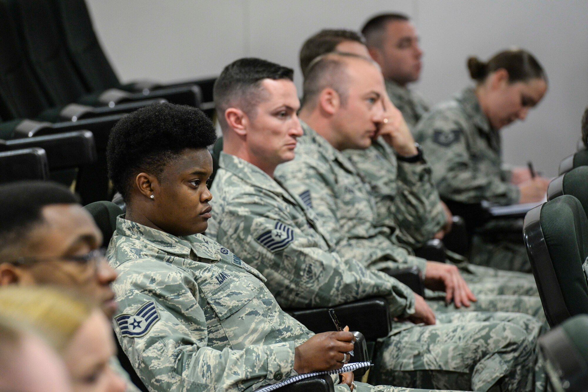 Noncommissioned officers listen in during a panel of senior noncommissioned officers at the second annual Atlantic Stripe Conference at the U.S. Air Forces in Europe and Air Forces Africa conference room on Ramstein Air Base, Germany, May 17, 2018. The professional development conference allowed NCOs time away from official duties to learn from leaders, mentors and guest speakers. (U.S. Air Force photo by Airman 1st Class D. Blake Browning)