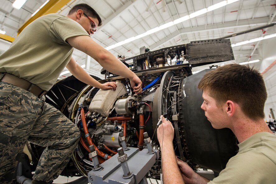 Airmen from the 23d Maintenance Squadron (MXS) aerospace propulsion flight, repair a Turbo-Fan (TF)-34 engine, May 16, 2018, at Moody Air Force Base, Ga. The 23d MXS propulsion flight’s mission is to ensure that the A-10C Thunderbolt II TF-34 engine is in satisfactory condition before it’s even installed on the aircraft. This flight is responsible for the overall upkeep and maintenance of all TF-34 engines for the Air Force’s largest operational A-10 fighter group. (U.S. Air Force photo by Airman 1st Class Eugene Oliver)