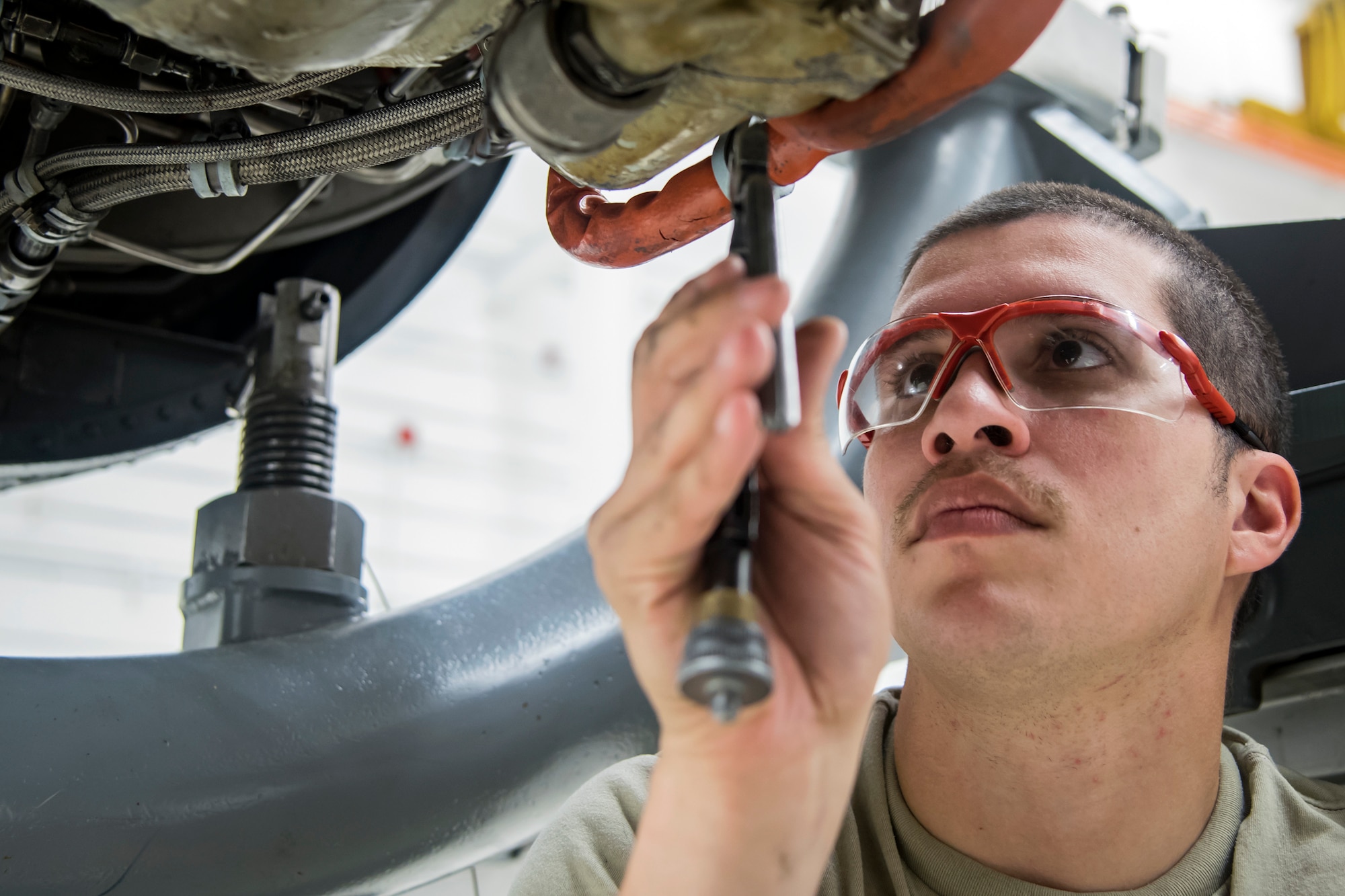 Airman 1st Class Christopher Martinez, 23d Maintenance Squadron (MXS) aerospace propulsion technician, repairs a Turbo-Fan (TF)-34 engine, May 16, 2018, at Moody Air Force Base, Ga. The 23d MXS propulsion flight’s mission is to ensure that the A-10C Thunderbolt II TF-34 engine is in satisfactory condition before it’s even installed on the aircraft. This flight is responsible for the overall upkeep and maintenance of all TF-34 engines for the Air Force’s largest operational A-10 fighter group. (U.S. Air Force photo by Airman 1st Class Eugene Oliver)