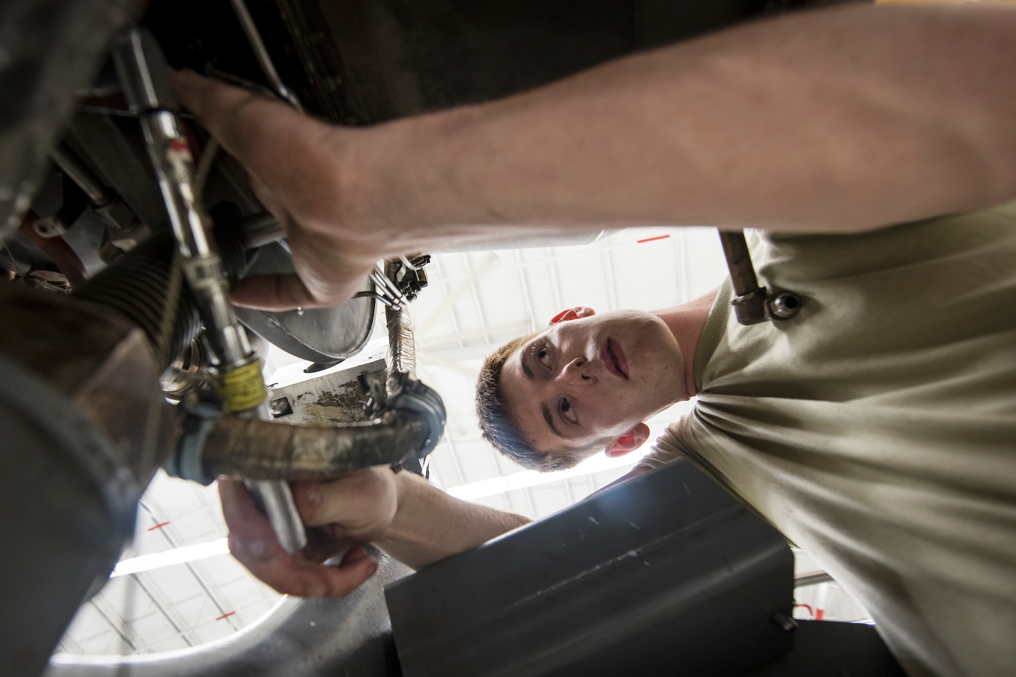 Airman 1st Class Blain Gehrett, 23d Maintenance Squadron (MXS) Aerospace Propulsion technician, repairs a Turbo-Fan (TF)-34 engine, May 16, 2018, at Moody Air Force Base, Ga. The 23d MXS propulsion flight’s mission is to ensure that the A-10C Thunderbolt II TF-34 engine is in satisfactory condition before it’s even installed on the aircraft. This flight is responsible for the overall upkeep and maintenance of all TF-34 engines for the Air Force’s largest operational A-10 fighter group. (U.S. Air Force photo by Airman 1st Class Eugene Oliver)