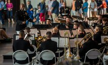 Chief Warrant Officer 2 DeMarius Jackson, officer in charge of Marine Forces Reserve Band, conducts the band during a Memorial Day Remembrance ceremony at the World War II Museum in New Orleans, May 26, 2018. The ceremony was an opportunity for the band to perform in honor of the men and women who have given the ultimate sacrifice for their nation.  (U.S. Marine Corps photo by Lance Cpl. Melany Vasquez/ Released)