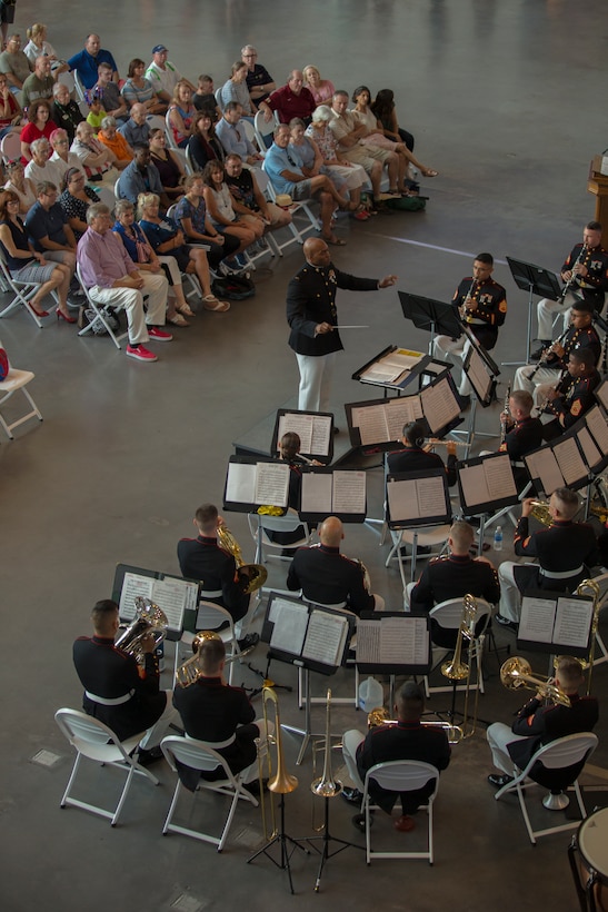 Chief Warrant Officer 2 DeMarius Jackson, officer in charge of Marine Forces Reserve Band, conducts the band during a Memorial Day Remembrance ceremony at the World War II Museum in New Orleans, May 26, 2018. The ceremony was an opportunity for the band to perform in honor of the men and women who have given the ultimate sacrifice for their nation.  (U.S. Marine Corps photo by Lance Cpl. Melany Vasquez/ Released)