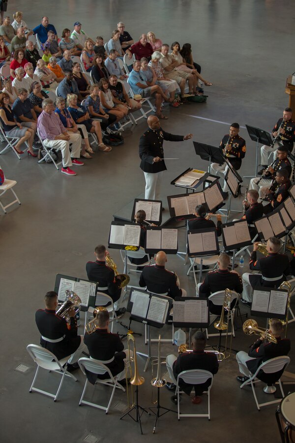 Chief Warrant Officer 2 DeMarius Jackson, officer in charge of Marine Forces Reserve Band, conducts the band during a Memorial Day Remembrance ceremony at the World War II Museum in New Orleans, May 26, 2018. The ceremony was an opportunity for the band to perform in honor of the men and women who have given the ultimate sacrifice for their nation.  (U.S. Marine Corps photo by Lance Cpl. Melany Vasquez/ Released)