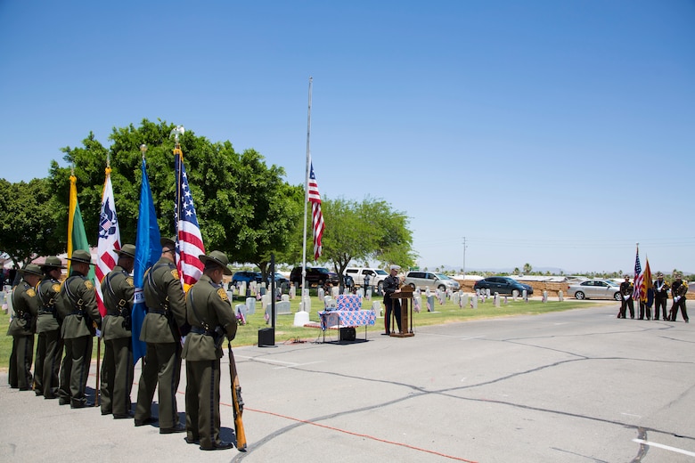 U.S. Marine Corps Col. David A. Suggs, the commanding officer of Marine Corps Air Station Yuma, Ariz., attends the Sunset Vista Memorial Day Ceremony in Yuma, Ariz., May 28, 2018. Col. Suggs participated in the ceremony as a guest speaker commemorating our fallen comrades and honoring those who have fallen in the line of duty. (U.S. Marine Corps photo by Sgt. Allison Lotz)