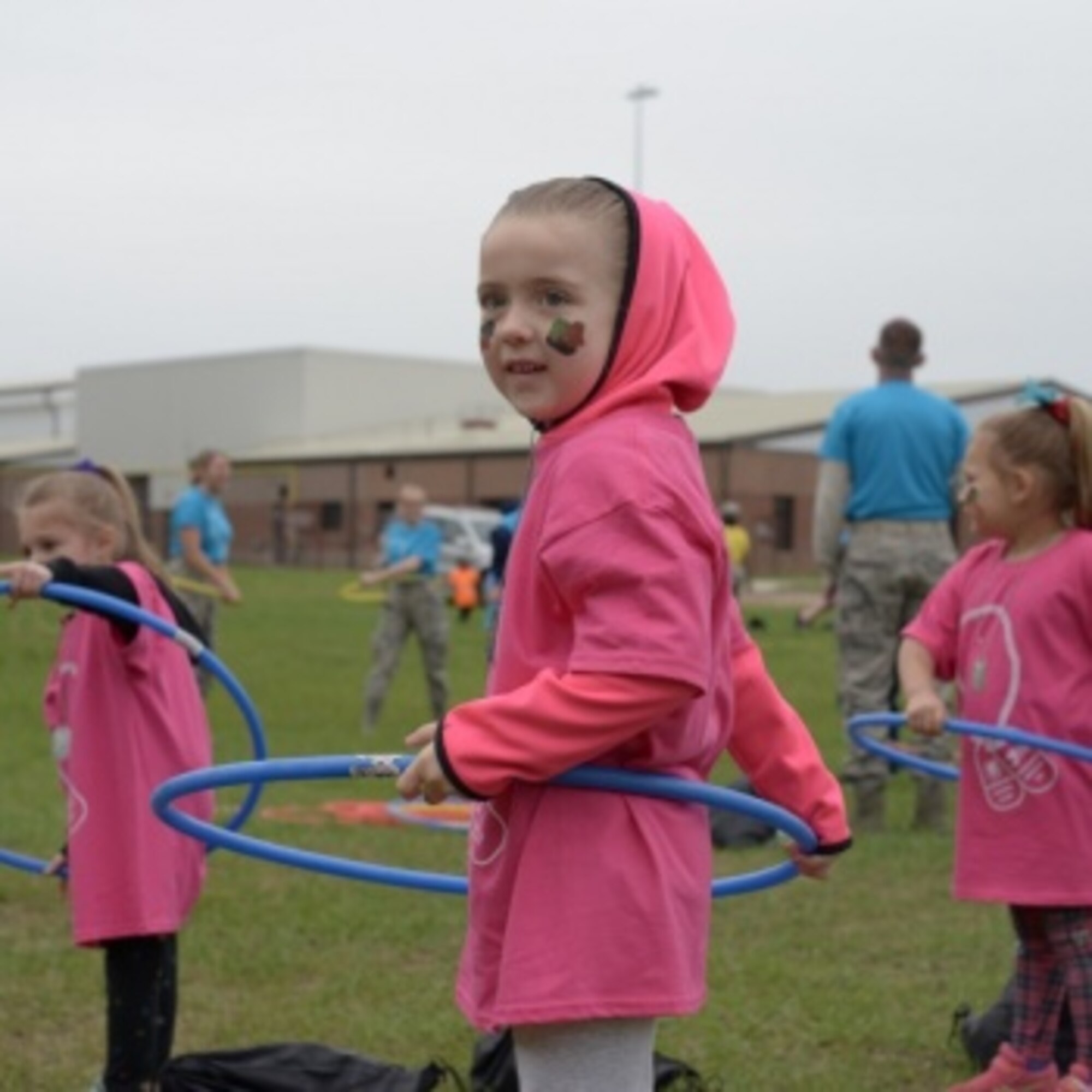 Children of Connecticut National Guardsmen learn how to hula-hoop May 19, 2018.