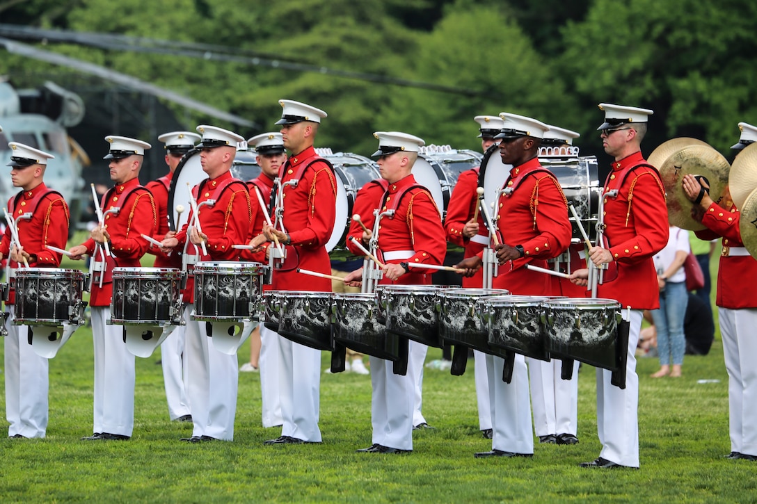 The U.S. Marine Corps Color Guard presents the National Ensign during the playing of the National Anthem during their performance as a part of New York Fleet Week at Prospect Park, Brooklyn, NY, May 26, 2018. Fleet Week New York is an opportunity for the American public to meet their Marine Corps, Navy and Coast Guard teams and experience America’s sea services. (Official Marine Corps photo by Cpl. Damon Mclean/Released)