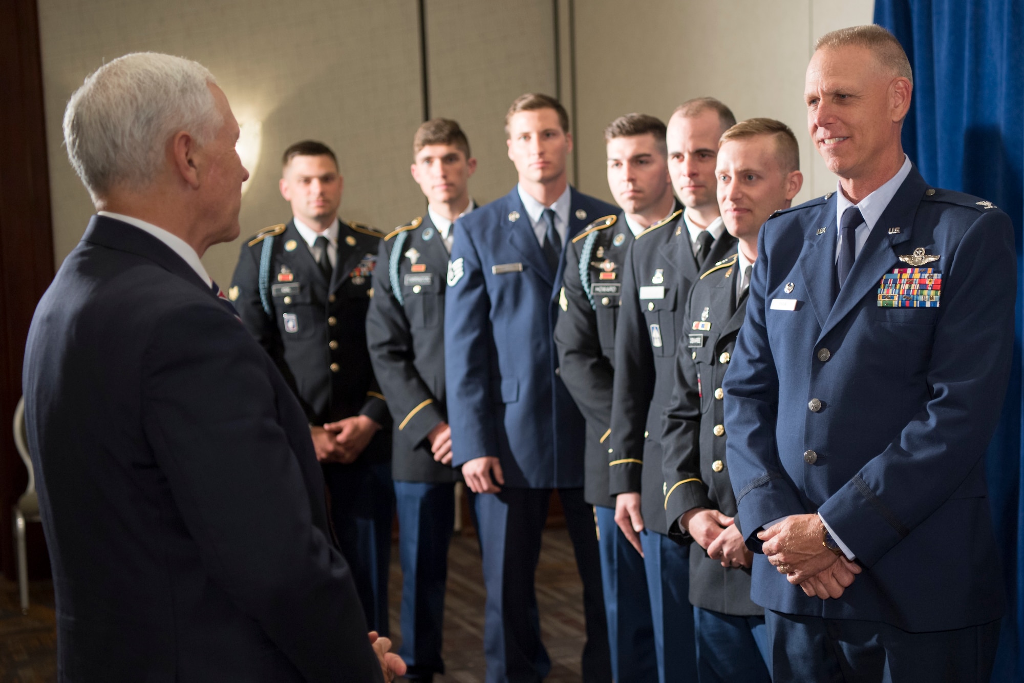Vice President Mike Pence thanks Col. Larry Shaw, 434th Air Refueling Wing commander, and Soldiers from the Indiana National Guard for their military service during a meet-and-greet in Indianapolis May 18, 2018. During the visit Pence highlighted the importance of the military and his continual support of their service. (U.S. Air Force photo/Tech. Sgt. Benjamin Mota)