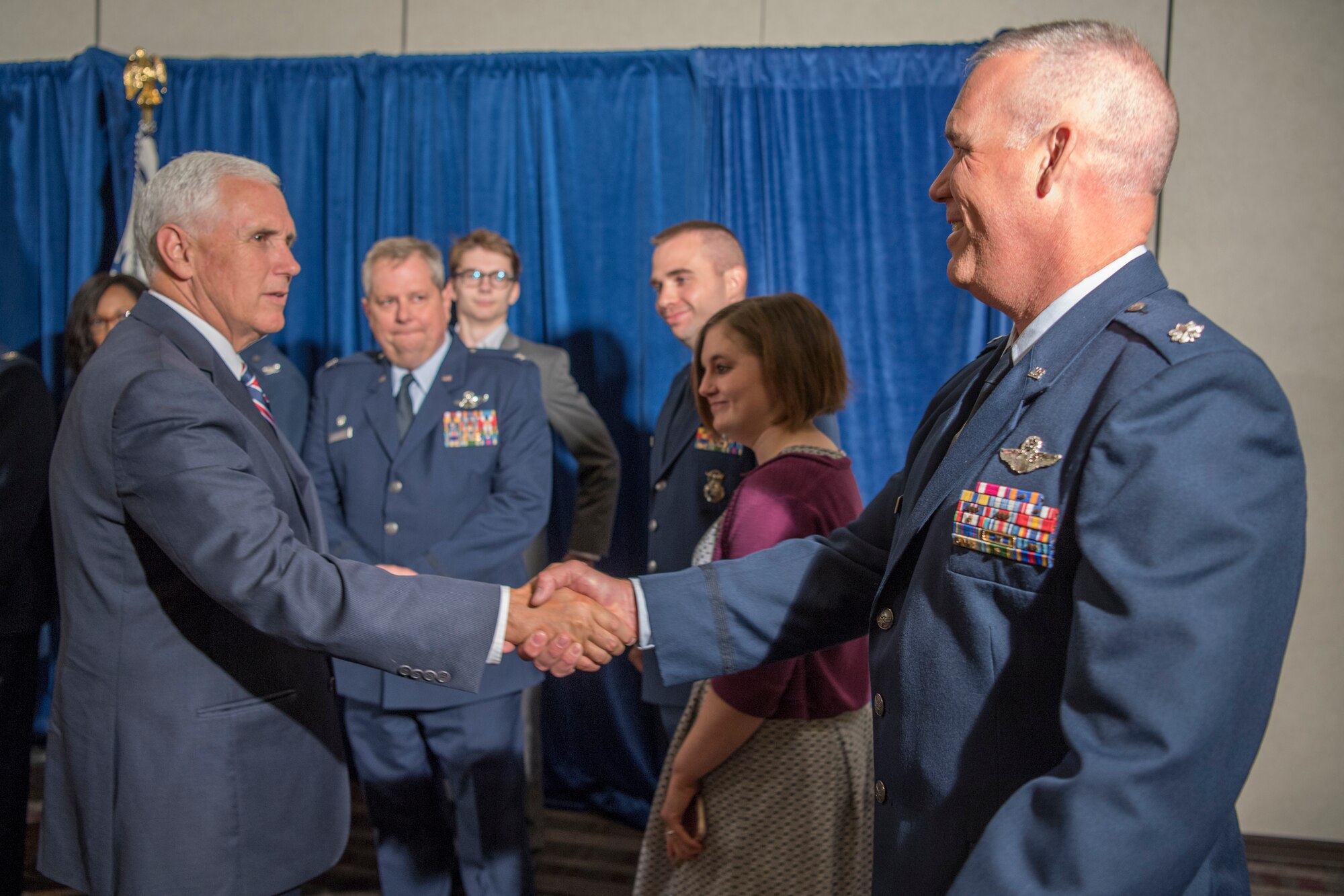 Lt. Col. Brian Thompson, 434th Air Refueling Wing chief of standards and evaluations, shakes hands with Vice President Mike Pence during a meet-and-greet in Indianapolis May 18, 2018. Thompson and five other key leadership from Grissom Air Reserve Base were invited to meet with Pence prior to his tax reform speech at the Indianapolis Downtown Marriott. (U.S. Air Force photo/Tech. Sgt. Benjamin Mota)