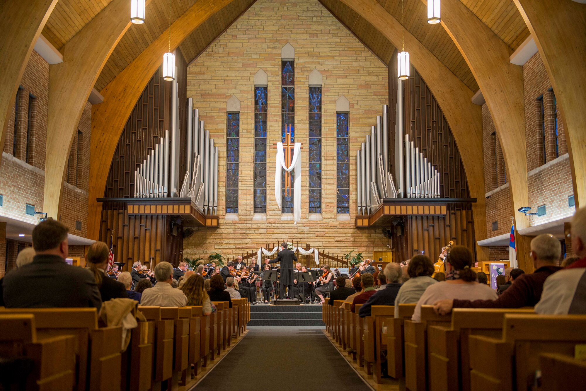 The Belleville Philharmonic Orchestra performs April 28, 2018, at the Saint Paul United Church of Christ in Belleville, Illinois. The orchestra is the second oldest, continuously performing orchestra in the United States and has two members who are also Airmen in the 375th Air Mobility Wing at Scott Air Force Base, Illinois. (U.S. Air Force Photo by Airman 1st Class Chad Gorecki)