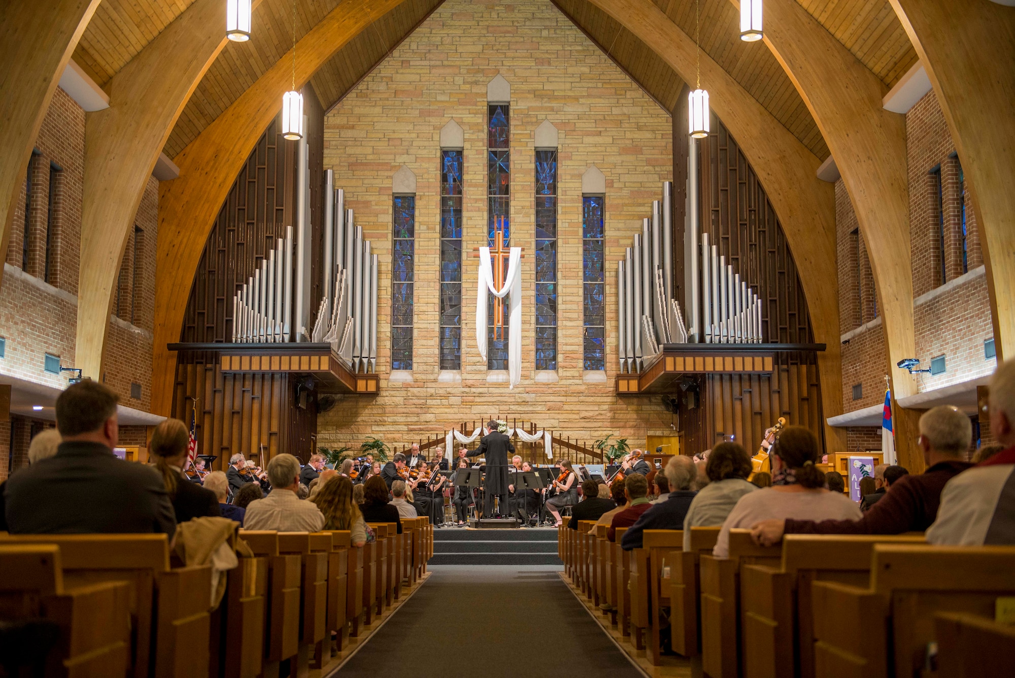 The Belleville Philharmonic Orchestra performs April 28, 2018, at the Saint Paul United Church of Christ in Belleville, Illinois. The orchestra is the second oldest, continuously performing orchestra in the United States and has two members who are also Airmen in the 375th Air Mobility Wing at Scott Air Force Base, Illinois. (U.S. Air Force Photo by Airman 1st Class Chad Gorecki)