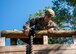 Capt. Samuel Taylor, 919th Special Operations Security Forces Squadron commander, prepares to surmount a rope wall obstacle at a course May 5, 2018 on Eglin Air Force Base, Fla.