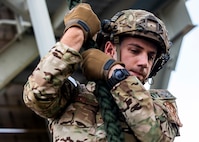 Tech. Sgt. Seth Ham, 919th Special Operations Security Forces Squadron, demonstrates fast roping techniques as he descends from a tower May 5, 2018 on Eglin Air Force Base, Fla.