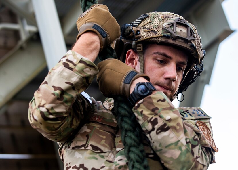 Tech. Sgt. Seth Ham, 919th Special Operations Security Forces Squadron, demonstrates fast roping techniques as he descends from a tower May 5, 2018 on Eglin Air Force Base, Fla.