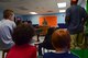 Maj. Reagan Beaton, 47th Flying Training Wing staff judge advocate, presides over a case accusing Luke Skywalker of exploding the death star at the youth center on Laughlin Air Force Base, Texas, May 30, 2018. To demonstrate the role of their office on Laughlin, the 47th JA team set up a mock trial to help children’s’ awareness on legal topics. (U.S. Air Force photo by Airman 1st Class Marco A. Gomez)