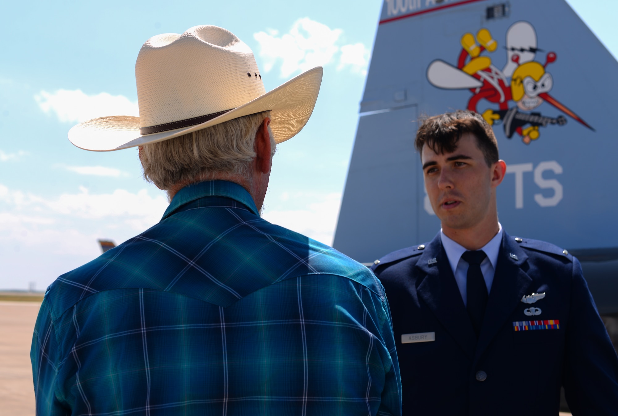 Second Lieutenant Colin Asbury (right), 47th Flying Training Wing pilot graduate, shows Lt. Col. (ret.) Thomas Byrd, former pilot, around the T-38C Talon after graduation at Laughlin Air Force Base, Texas, May 18, 2018. Byrd graduated from pilot training at Laughlin as well, and was brought back to present Asbury a pair of wings that have been handed down for three generations now. (U.S. Air Force photo by Senior Airman Benjamin N. Valmoja)