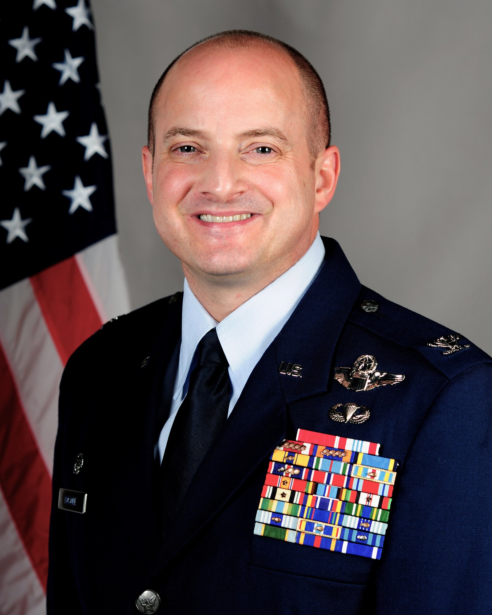 Colonel John W. Bosone, 8th Fighter Wing commander, took an official photo at Kunsan Air Base, Republic of Korea. He serves as the U.S. Forces Korea Area VI commander for more than 7,000 forward-stationed and combat-ready Air Force and Army personnel.