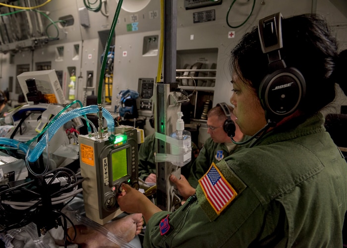 Image of an Airman providing respiratory therapy.