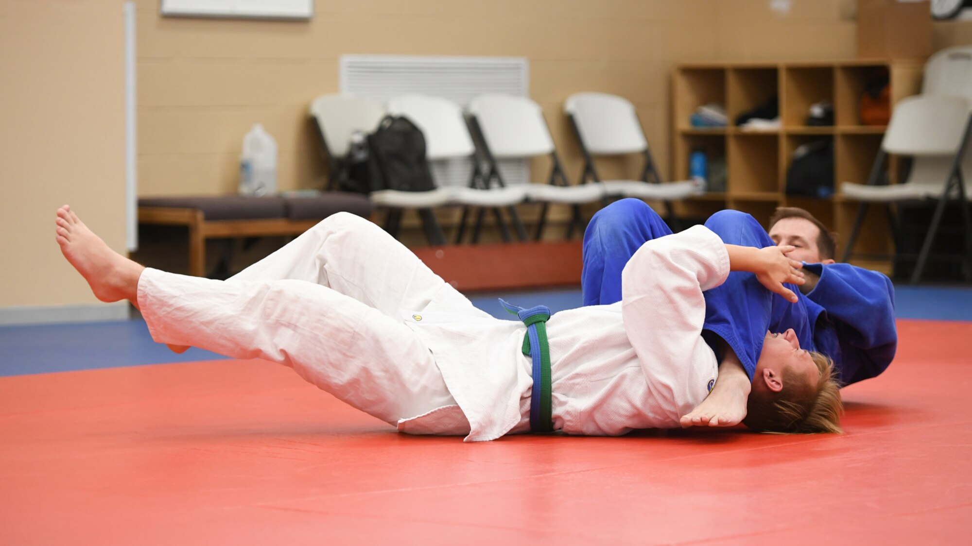 Hill Judo coach Don Chesmer demonstrates a joint-locking technique with Zac Phipps, one of his long-time students, during a free interactive training session at Hess Fitness Center on World Judo Day Oct. 30.